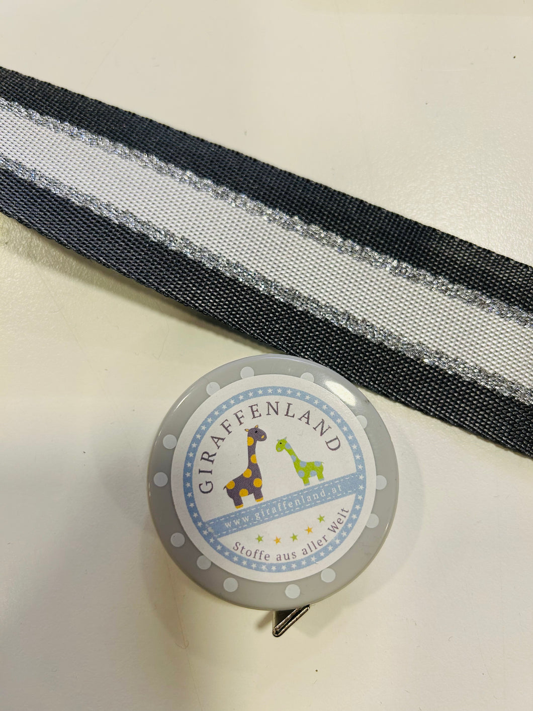 Gurtband 40mm Streifen grau/silber beidseitig