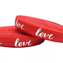 Lade das Bild in den Galerie-Viewer, Gummiband Haarband Armband Love silber auf rot
